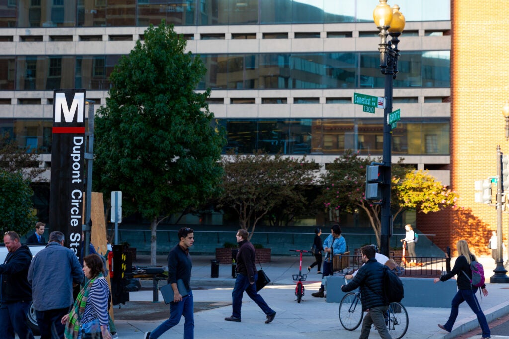 people walking near Dupont circle metro